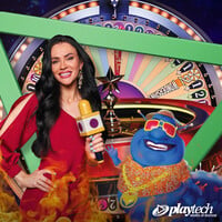 LuckyVegas live casino studio with dealer at a roulette table